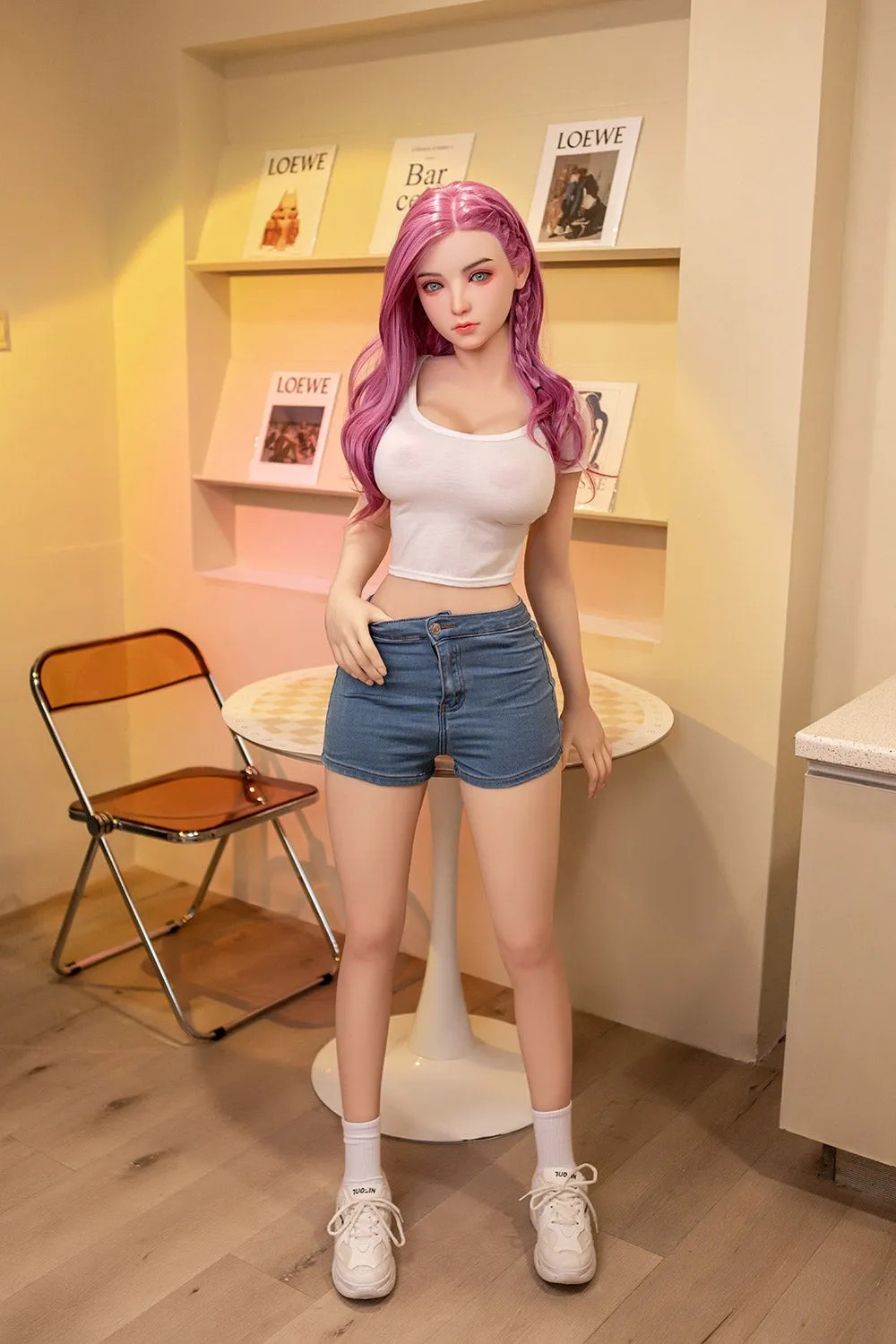 In stock at EU warehouse: TPE realistic sex doll, featuring long pink hair, a white crop top, and denim shorts.