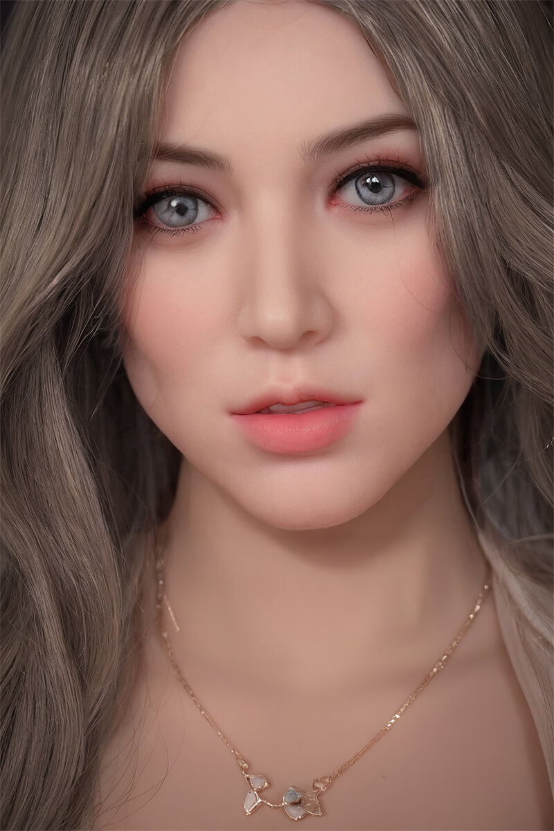 In stock at our European warehouse: TPE realistic doll, available in 138 cm (54-inch) and 161 cm (63-inch) sizes, dressed in a nude-pink tight-fitting dress and featuring long brown hair.