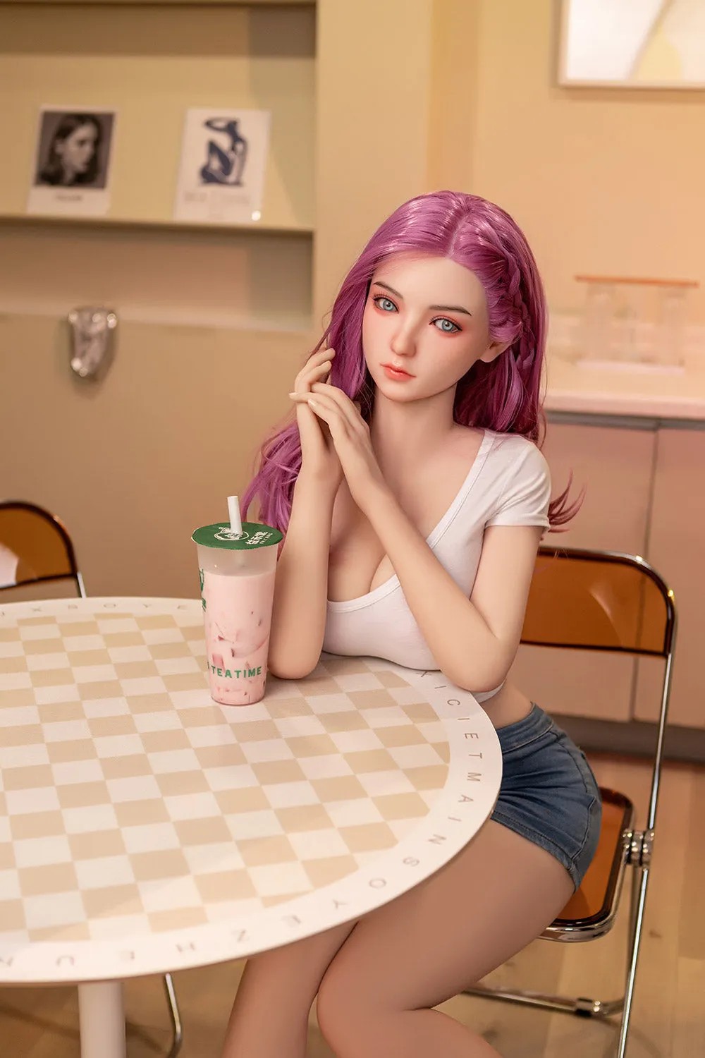 In stock at EU warehouse: TPE realistic sex doll, featuring long pink hair, a white crop top, and denim shorts.